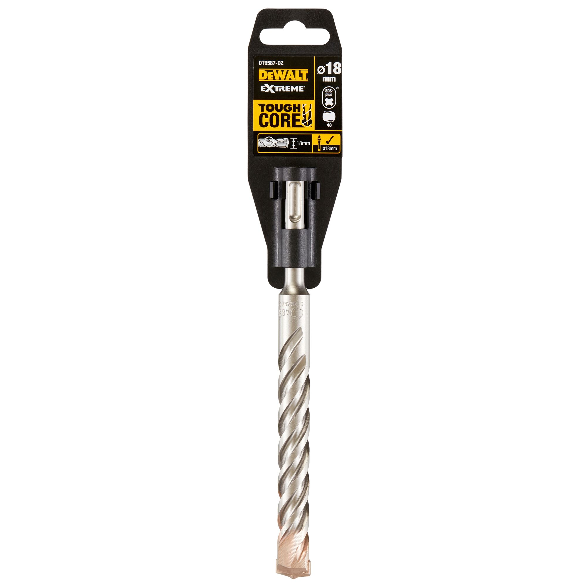 A DEWALT Extreme Tough Core drill bit, packaged, with 18mm diameter indicated on the label. The bit features a spiral design and is intended for heavy-duty drilling applications.