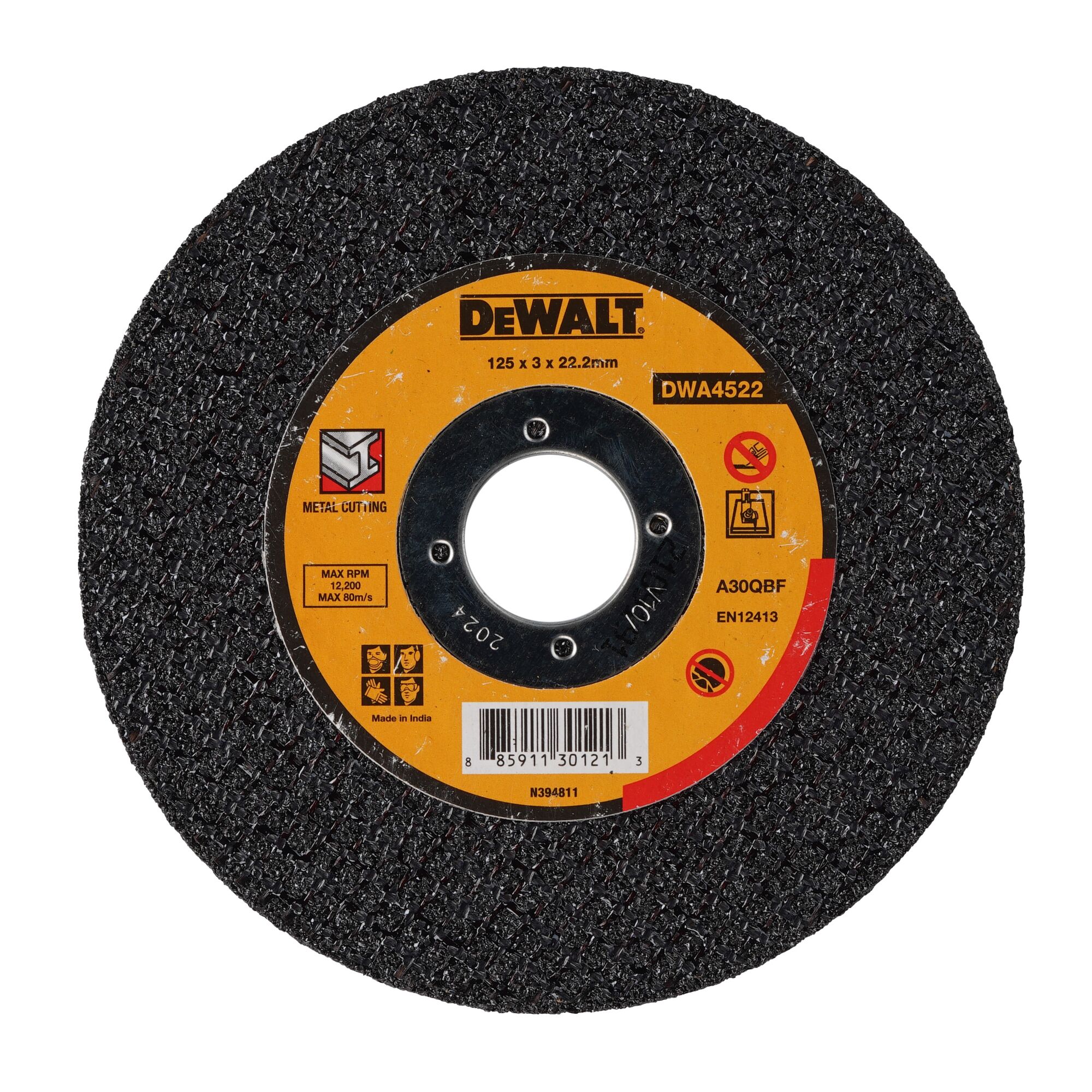 A DEWALT DWA4522 circular cutting disc, 125mm diameter, designed for metal cutting. The disc is black with a central yellow label displaying brand, specifications, and safety icons.