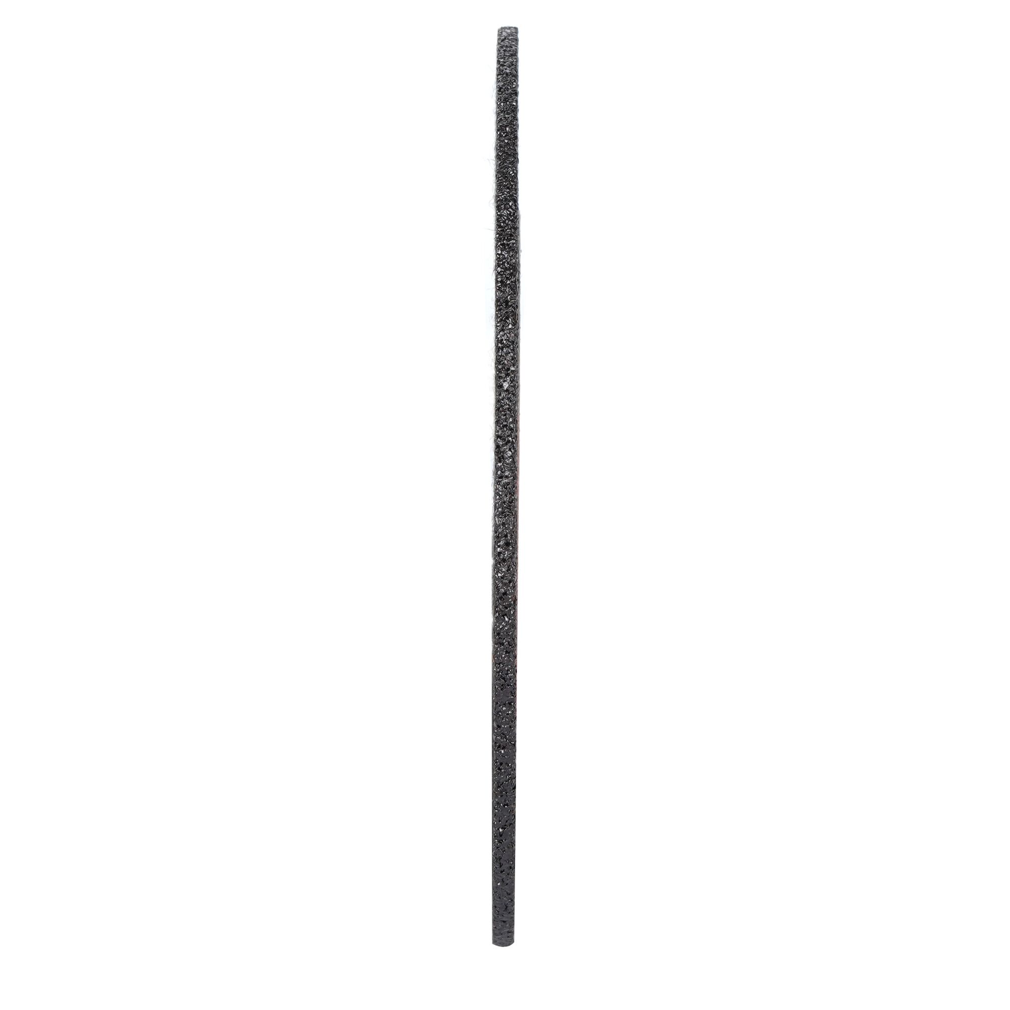 Side view of a thin, round grinding or cutting disc with a rough textured surface, photographed against a white background.